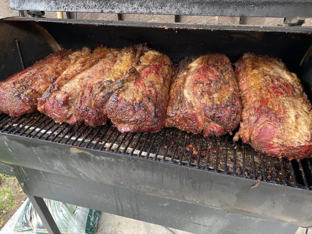 prime rib being smoked on a bbq