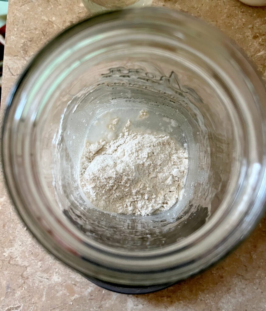 gluten free flour and water in a jar