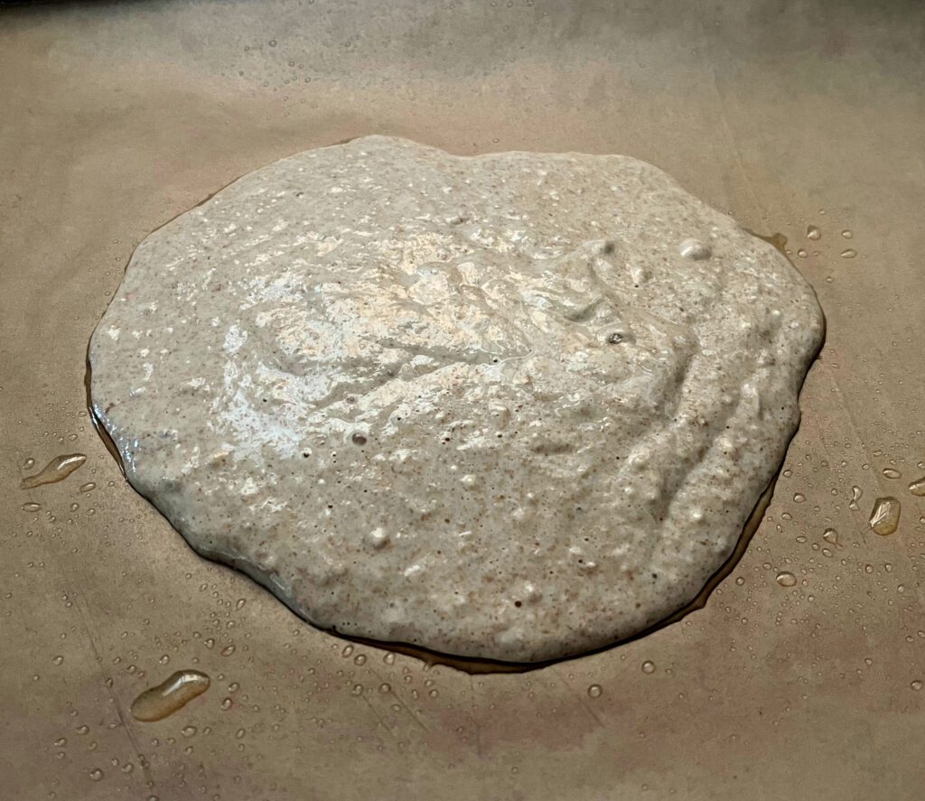 sheet pancake on parchment paper ready to go into the oven