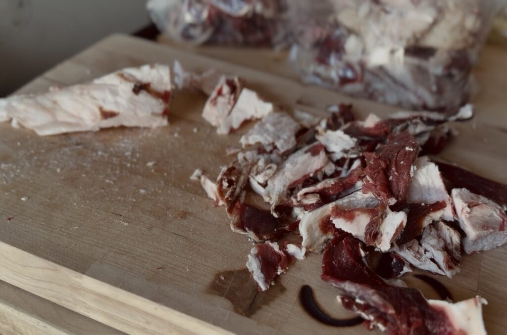 deer fat trimmings on a cutting board