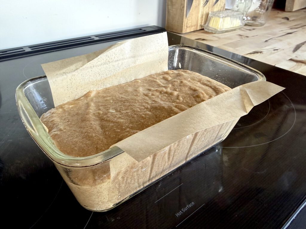 banana bread batter in loaf pan